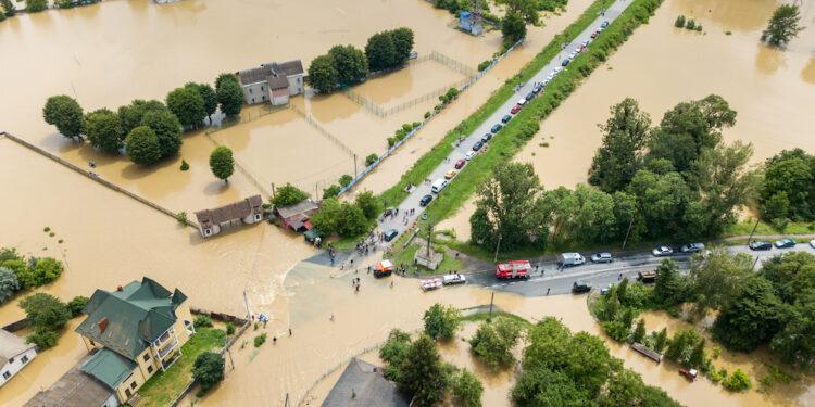 Aerial view of flooded houses and rescue vehicles saving people in Halych town, western Ukraine.