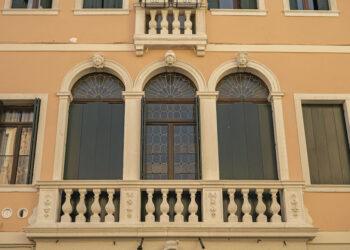 Detail of Balcony with arch in historic building